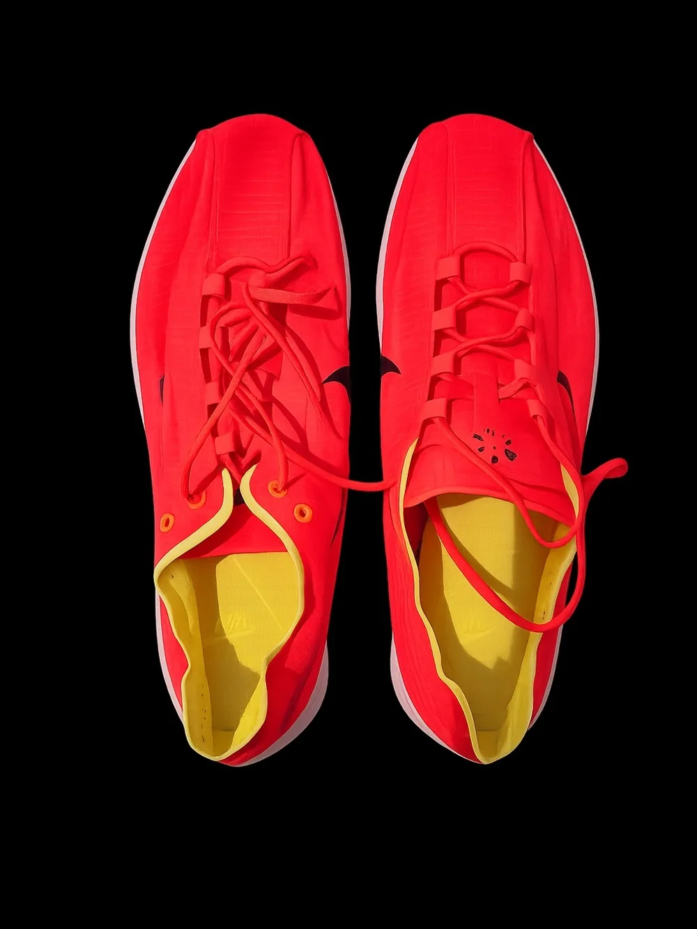 Nike Red Athletic Running Shoes with Black Swoosh and Yellow Accents